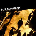 Blue October UK:n albumin "Walk Amongst the Living" kansikuvassa näkyy ylhäältä vinosti alaspäin otettu kuva ihmislaumasta, joka kävelee päivänvalossa. Ihmisistä näkyy mustat siluetit. Kuvan vasempaan yläkulmaan laitettu bändin logo valkoisell