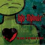 God Modulen "The Magic In My Heart Is Dead" -levyn etukannessa näkyy piirros vihreästä ihmistä muistuttavasta hahmosta, jolla on rinnassa musta sydämenmuotoinen aukko. Kuvan yläosassa oikeassa laidassa verenpunaisella värillä God Modulen logo ja s