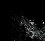 Mustavalkoinen piirros jonkinlaisesta harmaasta roiskeesta, joka kuvan oikeassa alakulmassa halkoo mustaa taustaa.