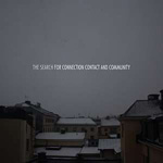 Valokuva kaupungista, jonka katoilla on jonkin verran lunta. Taivas on harmaa. Sen päällä lukee valkoisella "The Search for Connection Contact and Community".