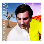 "Morning"-albumin kannessa mustahiuksinen mies, joka katselee alaspäin. Taustalla aavikkoa vasemmalla puolen ja abstraktia hietikkoa oikealla.