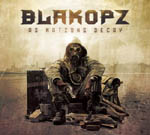 "As Nations Decay" -albumin etukannessa kuva miehestä tai naisesta, joka pukeutunut ryysyihin ja jonka kasvoja peittää kaasunaamari. Kuvan yläosassa BlakOPz-logo.