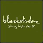 Black Strobe -bändin 'Shining bright star EP':n kansikuva, joka on tummanvihreä. Keskellä lukee kaunokirjoituksella bändin ja levyn nimi.
