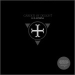 Mustaa taustaa vasten kuvan keskellä Garden Of Delight -logo tummanharmaalla värillä.