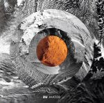 Harmaasävyistä taustaa vasten ruskea rinkula. Se muistuttaa kraatteria.