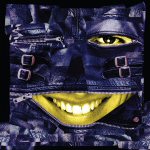 Valokuva tummansinisestä nahkanaamiosta, jossa on suun kohdalla vetoketju ja sen sisällä keltaisena hymyilevän ihmisen kasvot.