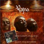 Rajnan "Duality"-albumin kansikuva. Kuvassa näkyy Rajnan logo yläosassa ja sen taustalla kynttilöitä, kolmen kivipatsaan kasvot ja alaosassa pientä pränttiä.